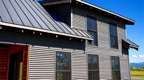 painting steel siding on house